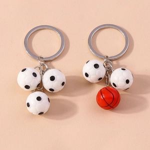 Sports theme football and basketball keychains with textured 3D ball pendants