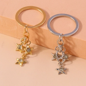Chic rhinestone star keychain pendants in gold and silver finish with crystal accents