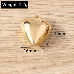 Detailed view of polished golden heart pendant with 19mm x 16mm size specifications