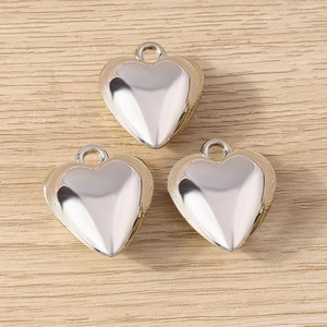 Three polished silver 3D heart pendants with rings for DIY jewelry making