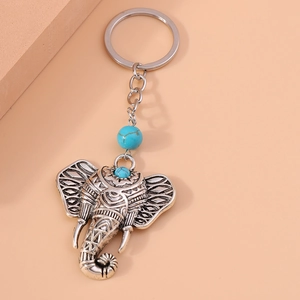 Vintage elephant keychain with turquoise beads and retro silver alloy bohemian design