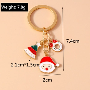 Detailed size specifications of Christmas Santa Claus keychain with festive enamel charms
