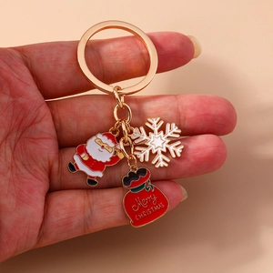 Christmas Santa Claus keychain with alloy snowflake and Merry Christmas gift bag charms