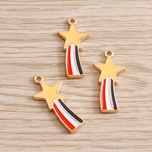 Detailed view of yellow enamel rainbow shooting star alloy charms for DIY jewelry making