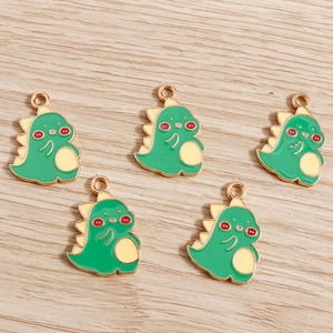 Five cute green enamel dinosaur charms in gold alloy finish for DIY jewelry and crafts