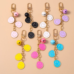 Portachiavi con Faccia Sorridente di Moda in Lega di Zinco Smaltato Ciondolo a Forma di Campana per Borsa Donna Zaino Accessori Regalo