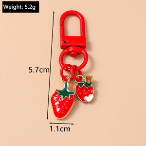Detailed strawberry keychain view with lobster clasp dimensions and weight specs