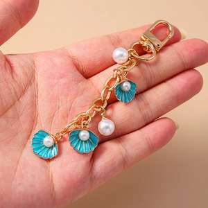 Cute ocean style starfish pearl shell keychain with teal enamel charms on golden chain
