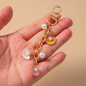 Cute cartoon starfish shell keychain with pearls and colorful ocean charms