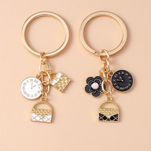 Elegant Zinc Alloy Camellia Quilted Bag Keychain Roman Numeral Clock Pendant Artificial Pearl Rhinestone Charm Key Ring