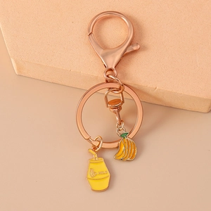 Porte-clés créatif en or rose avec pendentifs banane et brique de lait jaunes mignons