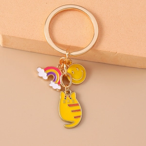 Cartoon cat keychain with rainbow and smiley face charms on high-quality alloy ring