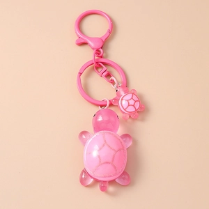 Pink resin turtle keychain with matching clasp and double mother-child turtle design