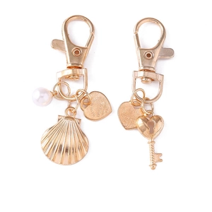 Rose gold starfish shell keychain with pearl and heart pendant for bag charm decor
