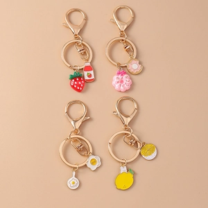 Cute cartoon food keychain set with strawberry milk and donuts for backpack charms