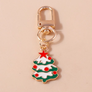 Detail of Christmas tree keychain with gold lobster clasp and green enamel pendant