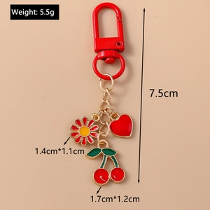 Detailed view showing dimensions and weight of floral cherry heart keychain pendant