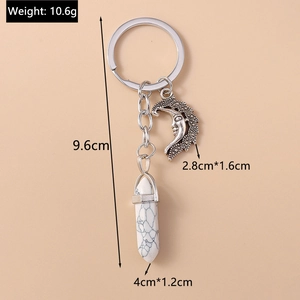 Detail showing dimensions of vintage moon pendant and white turquoise stone keychain