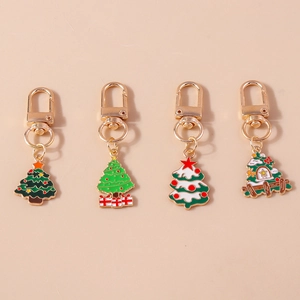 Set of 4 Christmas tree alloy pendants with gold lobster clasps and colorful enamel details
