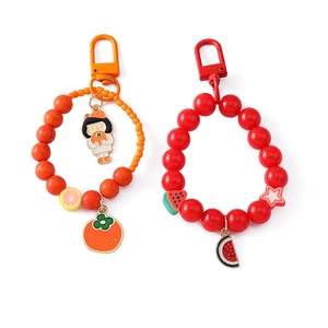 Colorful beaded fruit keychains with cute cartoon girl and orange watermelon charms