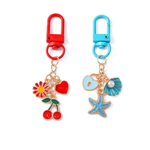 Fashionable keychain charms with heart, cherry, and starfish designs for bags