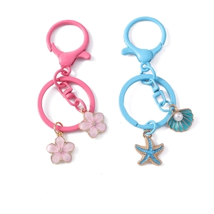 Pink enamel flower and blue starfish shell keychains with pearls for bag decoration
