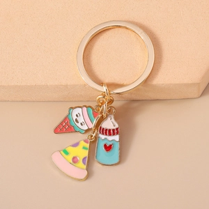 Mignon porte-clés doré avec pendentifs en forme de glace, pizza et biberon de dessin animé