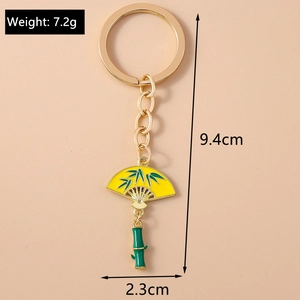 Detailed view of Chinese style folding fan keychain with green bamboo charm and dimensions