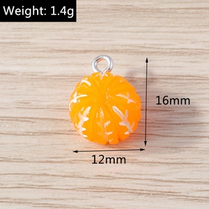Macro detail of resin orange pendant showing 16mm height and 12mm width measurements