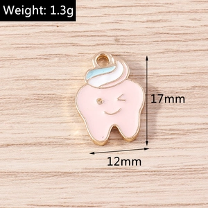 Detail view of pink cartoon tooth pendant with dimensions 17x12mm and 1.3g weight