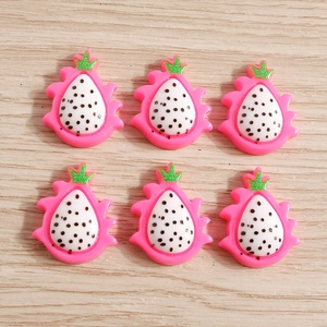 Detailed view of six resin dragon fruit charms for DIY crafts and phone case decor