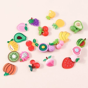 Mix of colorful resin fruit charms including strawberry and avocado for DIY crafts and phone cases