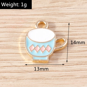 Macro detail of 1g light blue cartoon teapot alloy pendant with size markings