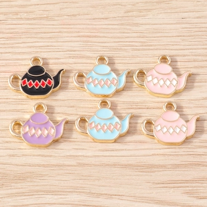 Detail of colorful teapot alloy charms with enamel finish for DIY jewelry crafting