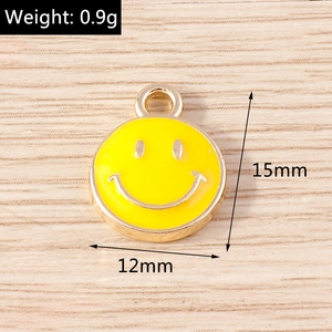 Detail view showing 12mm yellow smiley face alloy pendant dimensions and 0.9g weight