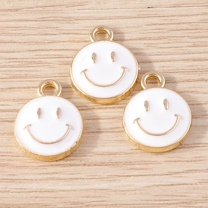 Three white enamel smiley face charms with golden alloy metal finish for DIY jewelry making