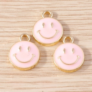 Three pink enamel smiley face charms with gold alloy plating for DIY jewelry making