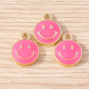Three bright pink smile face charms with gold alloy edges for DIY jewelry making