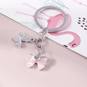 Eleganter Legierung Silber Strass Schmetterling Schlüsselanhänger Rosa Harz Schleife Herz Anhänger Für Damen Taschenzubehör Handy-Anhänger Geschenk
