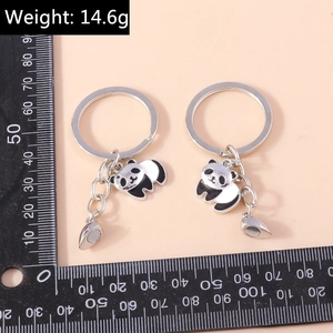 Creative panda magnet couple keychain with heart charms and polished alloy finish
