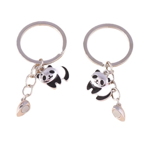Magnetic panda couple keychain set in polished silver metal with heart-shaped magnet