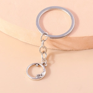 Classic silver metal moon face and star keychain accessory for bags and phones