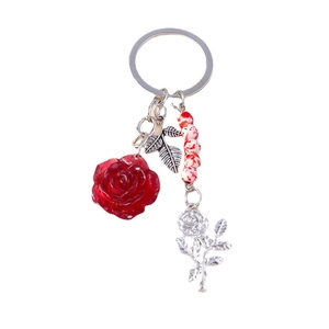 Elegant deep red resin rose keychain with silver metal leaves and vintage bead pendant