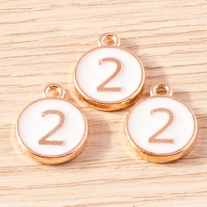 Three rose gold number 2 charms with white enamel inlay for DIY jewelry making