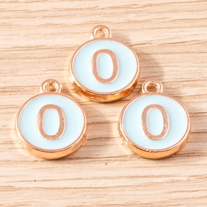 Detail showing rose gold alphabet O pendant with light blue enamel for DIY jewelry