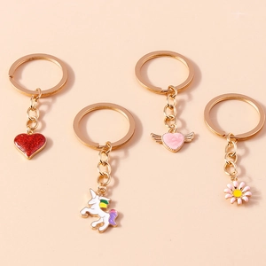 Creative cartoon unicorn and heart flower keychain set in gold alloy finish
