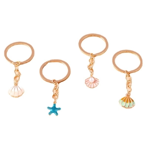 Süße Seestern- und Muschel-Schlüsselanhänger in Gold mit bunten Emaille-Anhängern