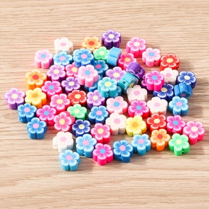 Mélange de perles fleurs en pâte polymère aux tons pastels pour création de bijoux DIY