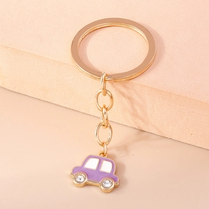 Porte-clés voiture violet mignon avec roues en cristal et anneau doré pour femmes