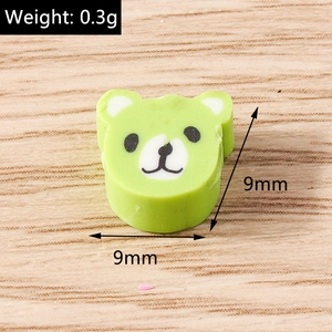 Macro detail of 9mm green bear bead for DIY jewelry with size and weight specs